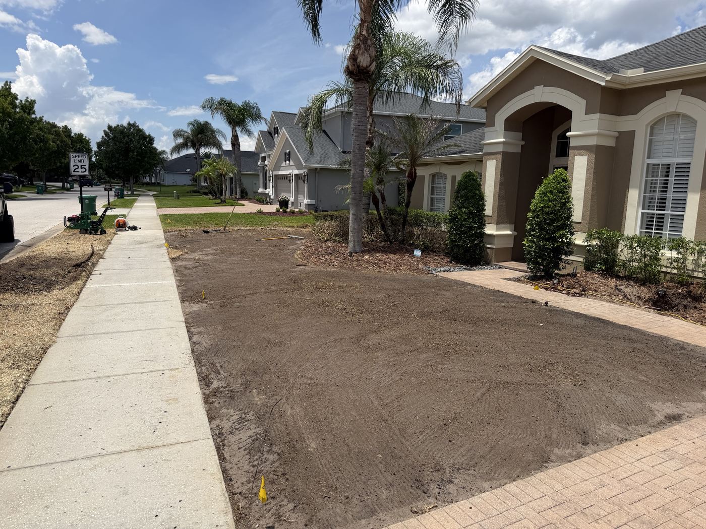 Front yard raked and graded smooth, ready for new sod